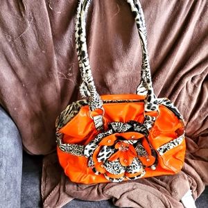 Orange and zebra hand bag